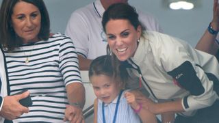 Carole Middleton, Princess Charlotte and Catherine, Princess of Wales attend the presentation following the King's Cup Regatta