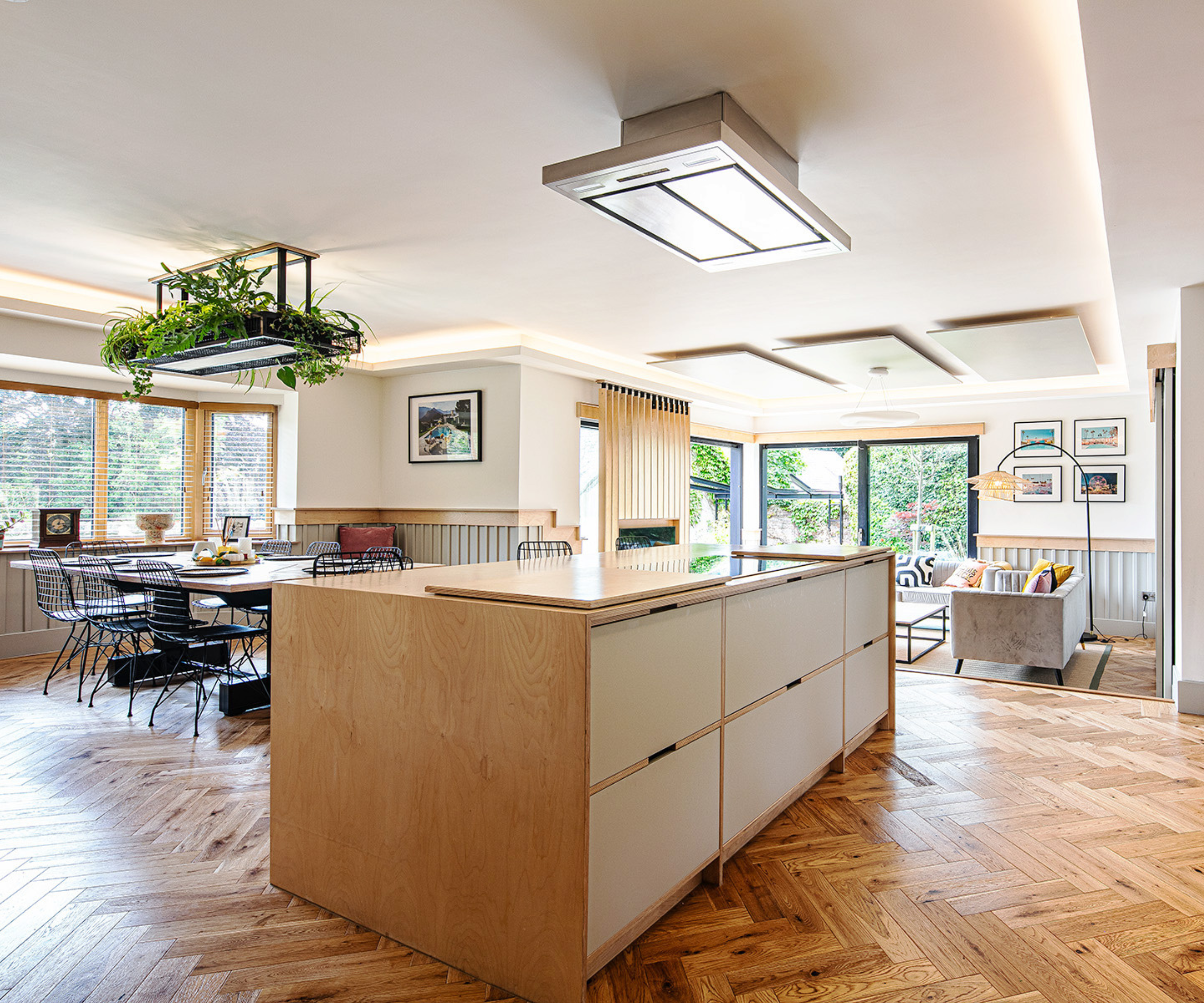 Open plan kitchen diner with wooden floor