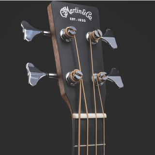 Cloae up of the headstock of a Martin DJR-10E electro-acoustic bass guitar