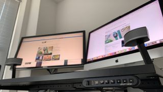 The UpLift V2 Desk and its keypad, and a monitor and an iMac sit atop the desk