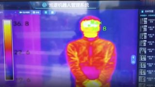 The 5G robots are able to monitor body temperature from up to five meters away.