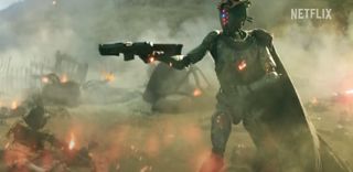 A robot wields a futuristic weapon in a sci-fi firefight.