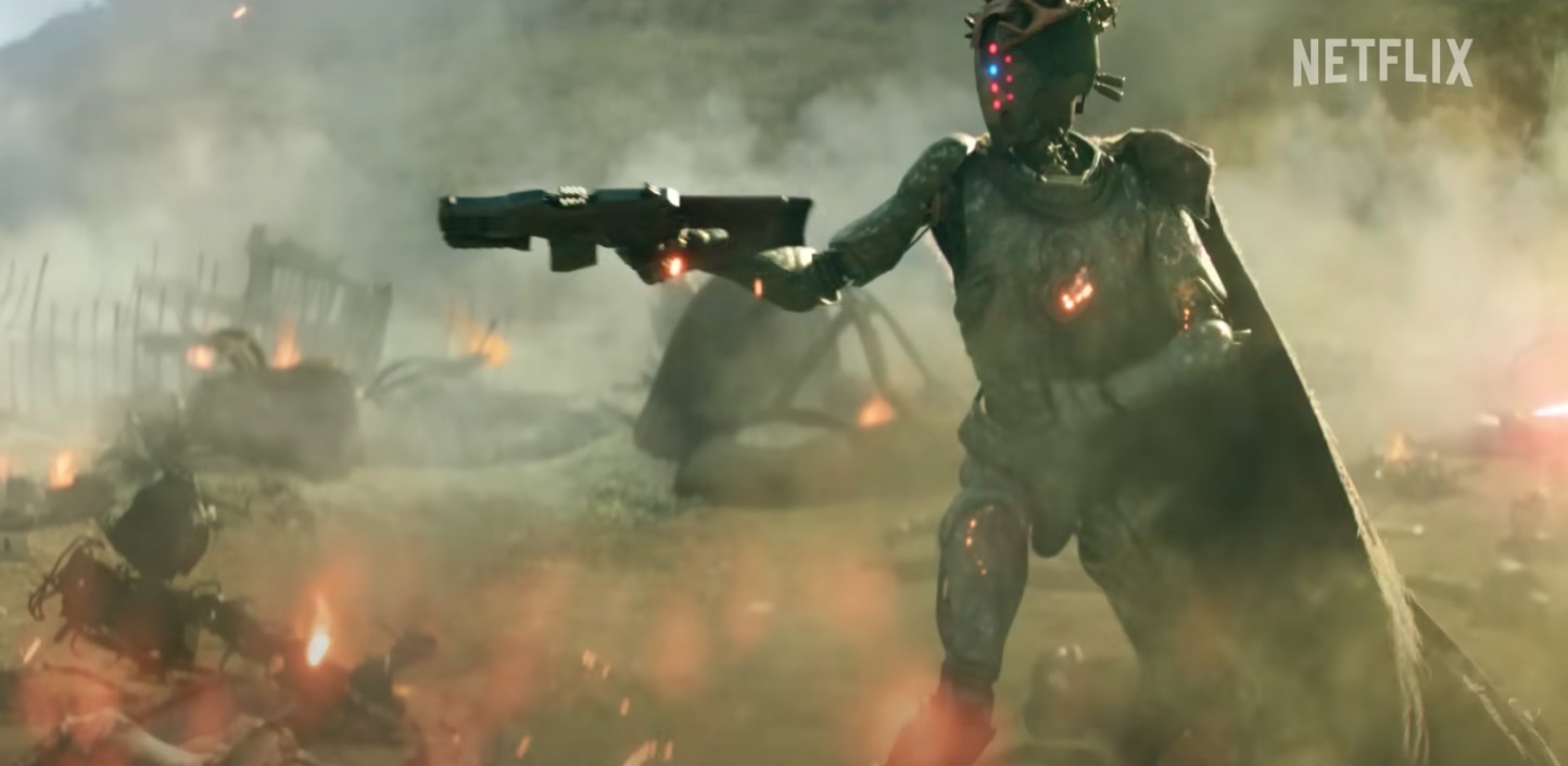 A robot wields a futuristic weapon in a sci-fi firefight.