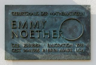 A plaque in her home town of Erlangen honors Emmy Noether and mentions her immigration to the U.S.