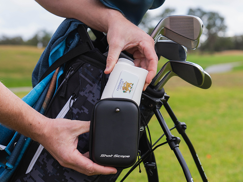The Shot Scope Pro X rangefinder being taken out of its case