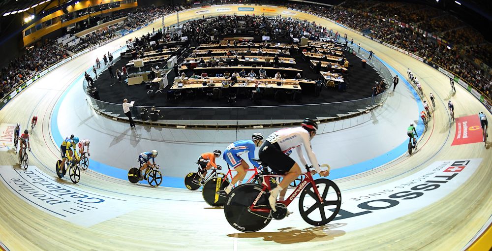 Cyclists take part in the men's Scratch final during the UCI Track Cycling World Championships in Apeldoorn