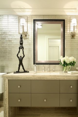 Bathroom vanity with black sculpture