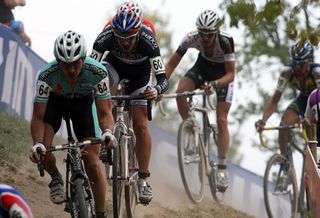 Germany's Christoph Pfingsten leads Poland's Mariusz Gil through an off camber section.