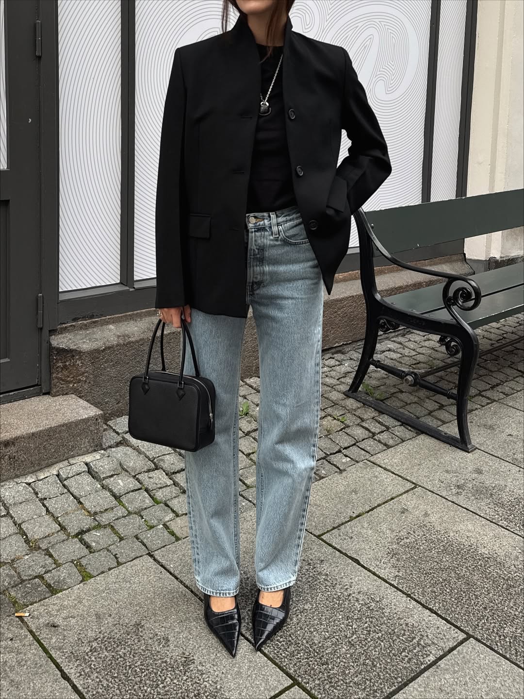 Influencer Annabel Rosendahl wearing stilettos and barrel leg jeans.