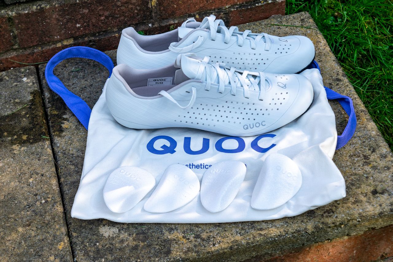 A pair of white Quoc M Pro Lace shoes