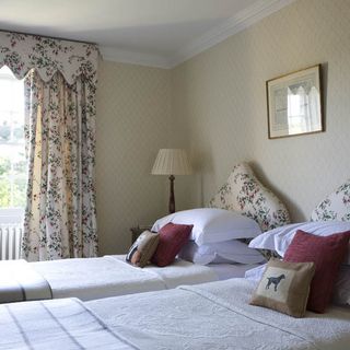 bedroom with bed and white bedding