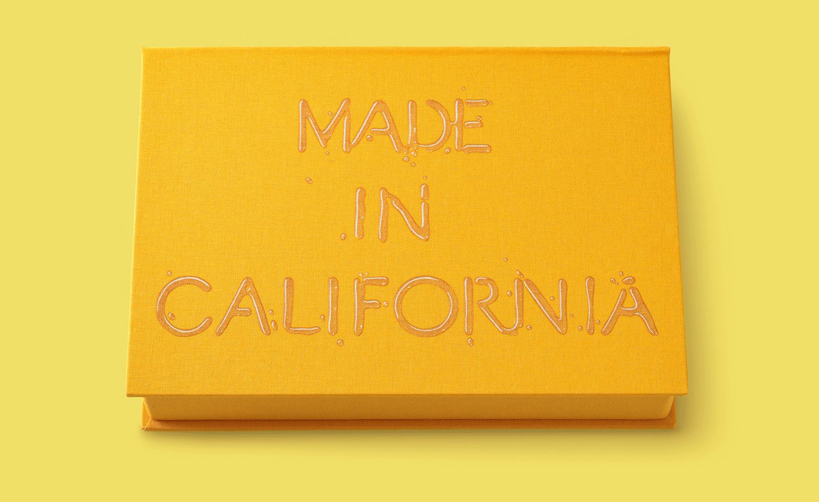 chocolate in yellow box against yellow background