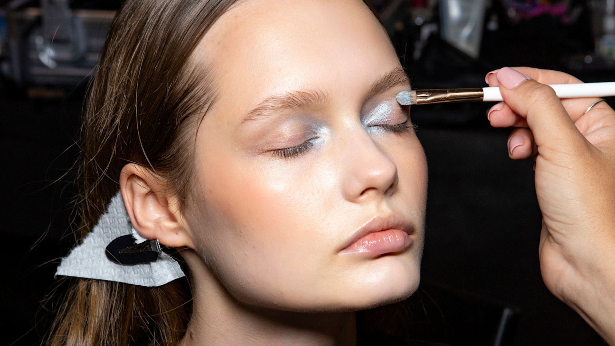 best eyeshadow - model backstage having silver eyeshadow applied
