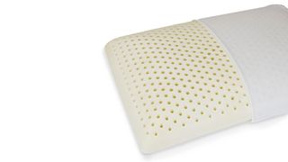 Natural latex pillow on a white background