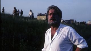 Topol in a field during the filming of The Storm Breaks