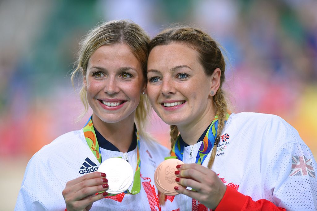 The smiling British duo of Rebecca James and Katy Marchant on the podium