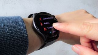 Woman scrolling through fitness tracking modes on Amazfit GTR 3 watch