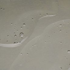 Clear serum-like liquid