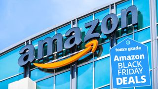 Amazon logo on glass building with Amazon Black Friday Deals tag 