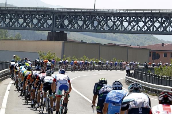 Riders speed down the road to Rapallo