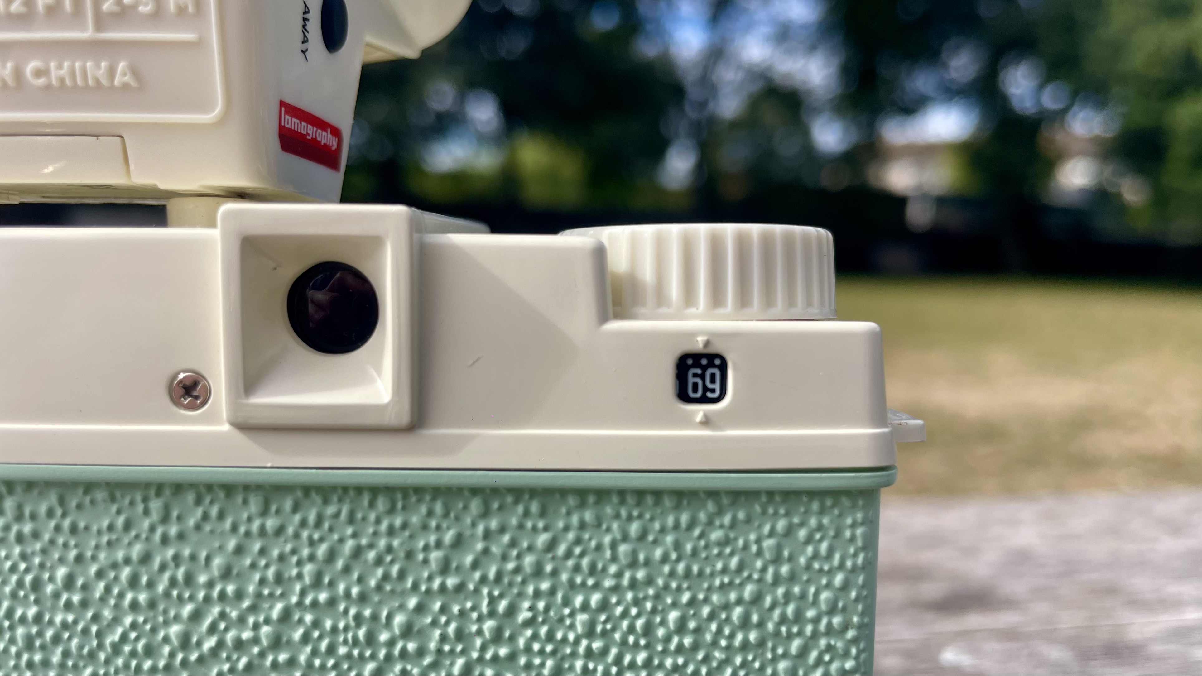 Lomography Lomourette half-frame film camera on a park bench