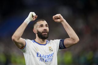 Karim Benzema celebrates victory for Real Madrid against Paris Saint-Germain in the Champions League in March 2022.