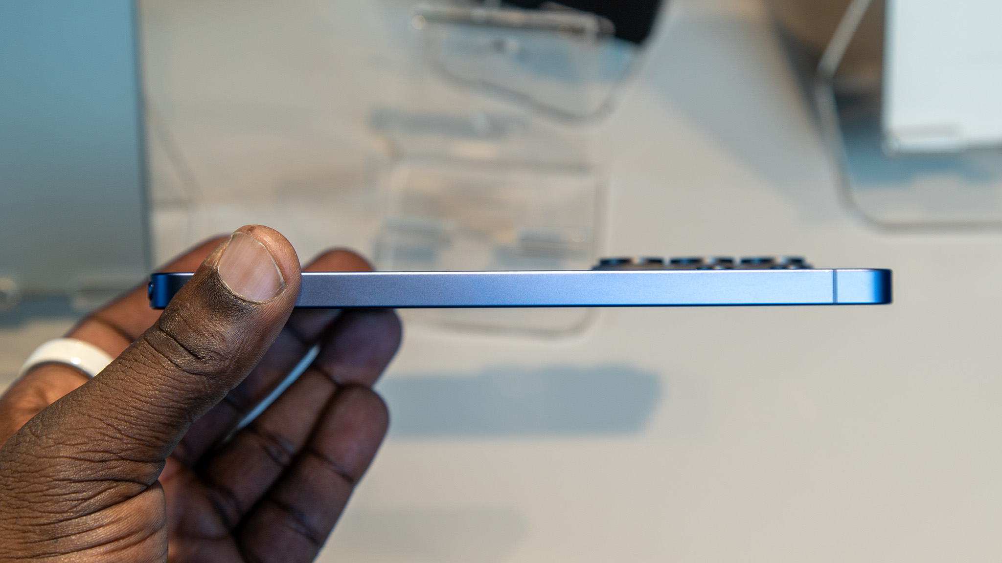 The metal frame of the sky blue Samsung Galaxy S26 Ultra