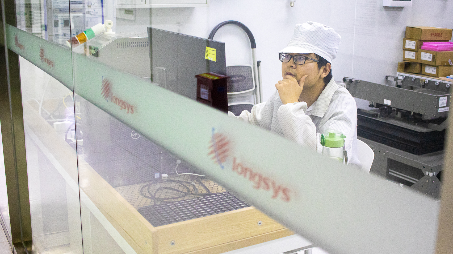 a Longsys employee working in the company's testing facility