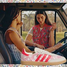 Adidas and Liberty London collaboration campaign imagery featuring two women in a camper van wearing sporty floral-print pieces with a collaged printed Samba sneaker