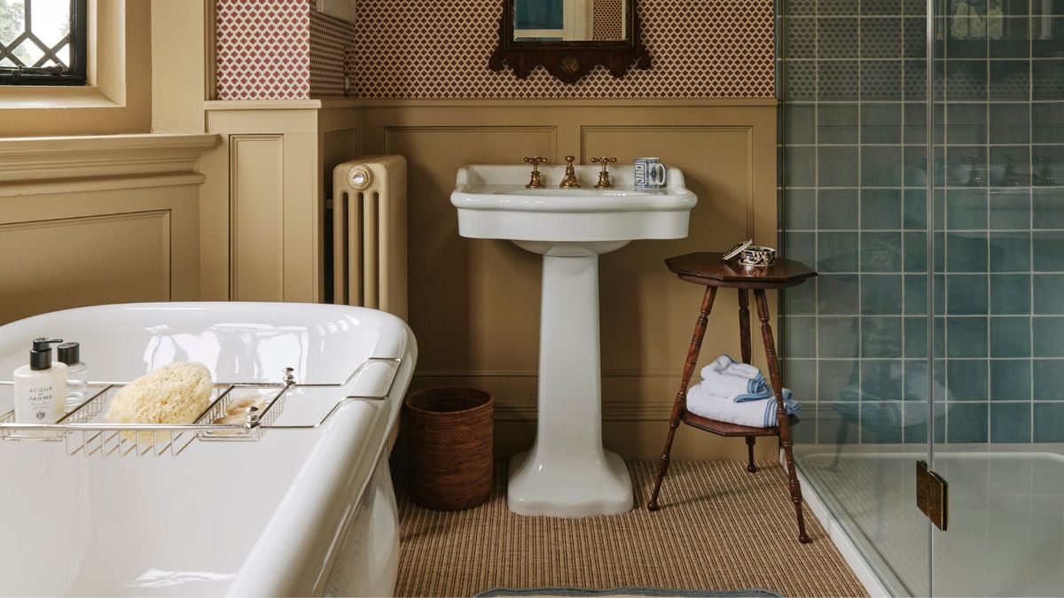 I can't believe I'm saying this, but is the carpeted bathroom making a return? Designers reveal whether this dated style can work in 2025