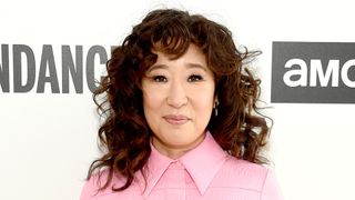 sandra oh with a curly full fringe