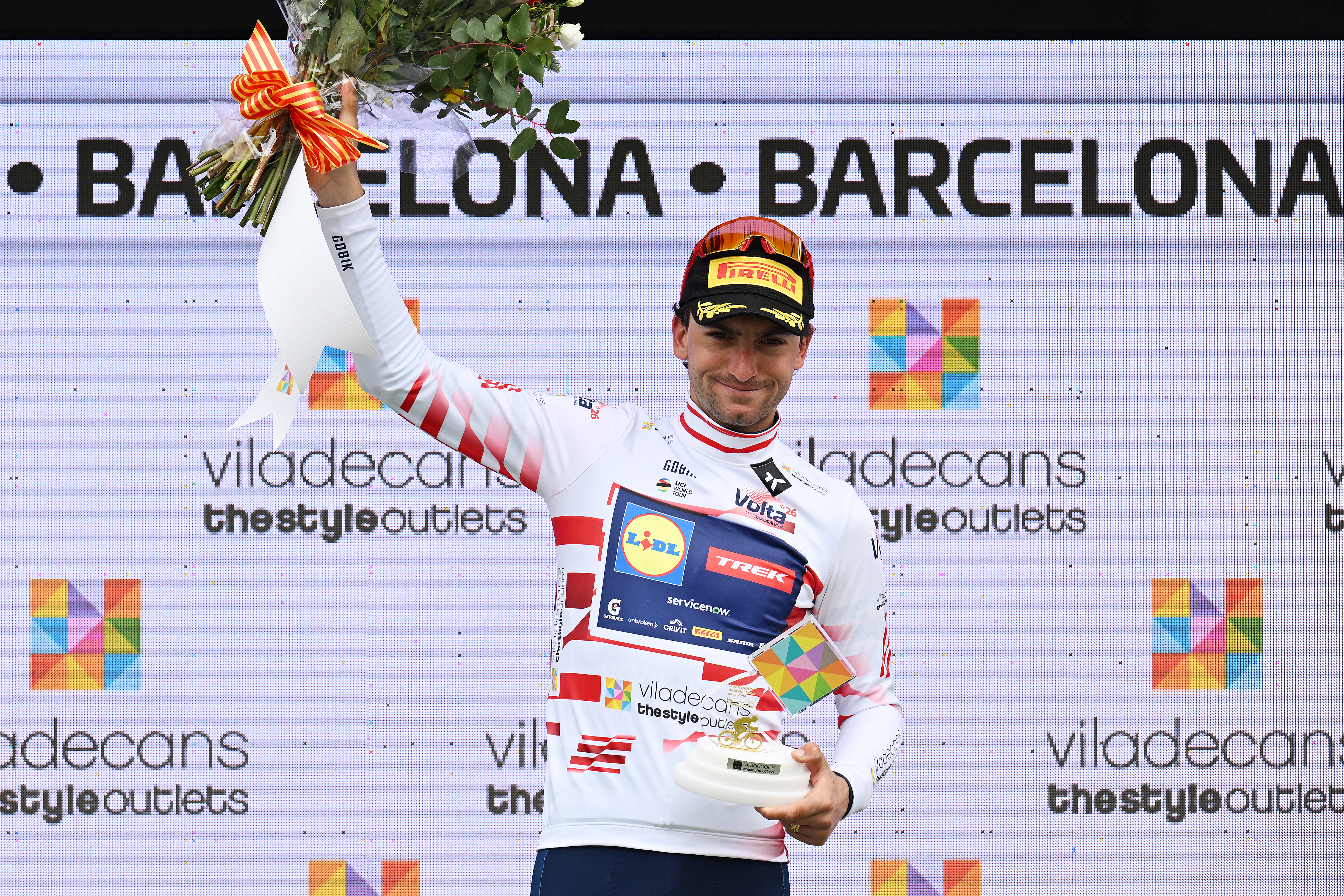 BARCELONA, SPAIN - MARCH 29: Giulio Ciccone of Italy and Team Lidl - Trek celebrates at podium as Red Mountain Jersey winner during the 105th Volta a Catalunya 2026, Stage 7 a 95.1km stage from Barcelona to Barcelona / #UCIWT / on March 29, 2026 in Barcelona, Spain. (Photo by Szymon Gruchalski/Getty Images)