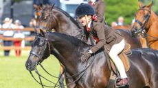 Heidi Cooper and Dowhills Nuage Noir in The show Hunter Pony Championship at The Royal Windsor Horse Show