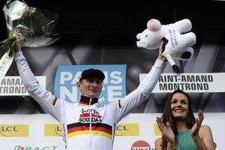 Stage winner Andre Greipel celebrates on the podium after winning the second stage of Paris-Nice