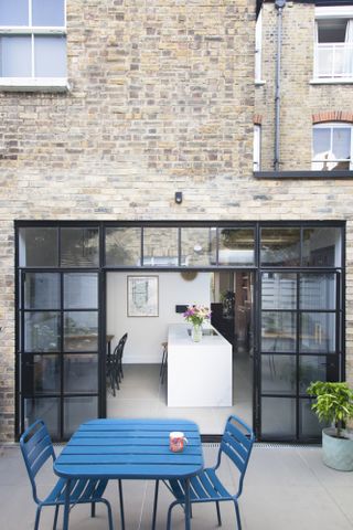 reclaimed bricks help this extension match the existing home