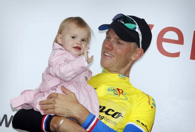 2013 Ster ZLM Toer champion Lars Boom with daughter Kee on the podium