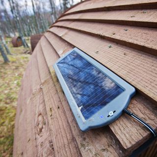 solar panel lighting with wooden roof