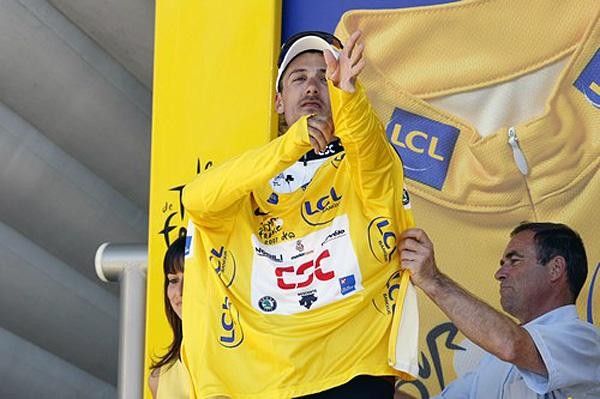 Cancellara puts on another yellow jersey after the sprinters' teams helped him bring back Wiggins.