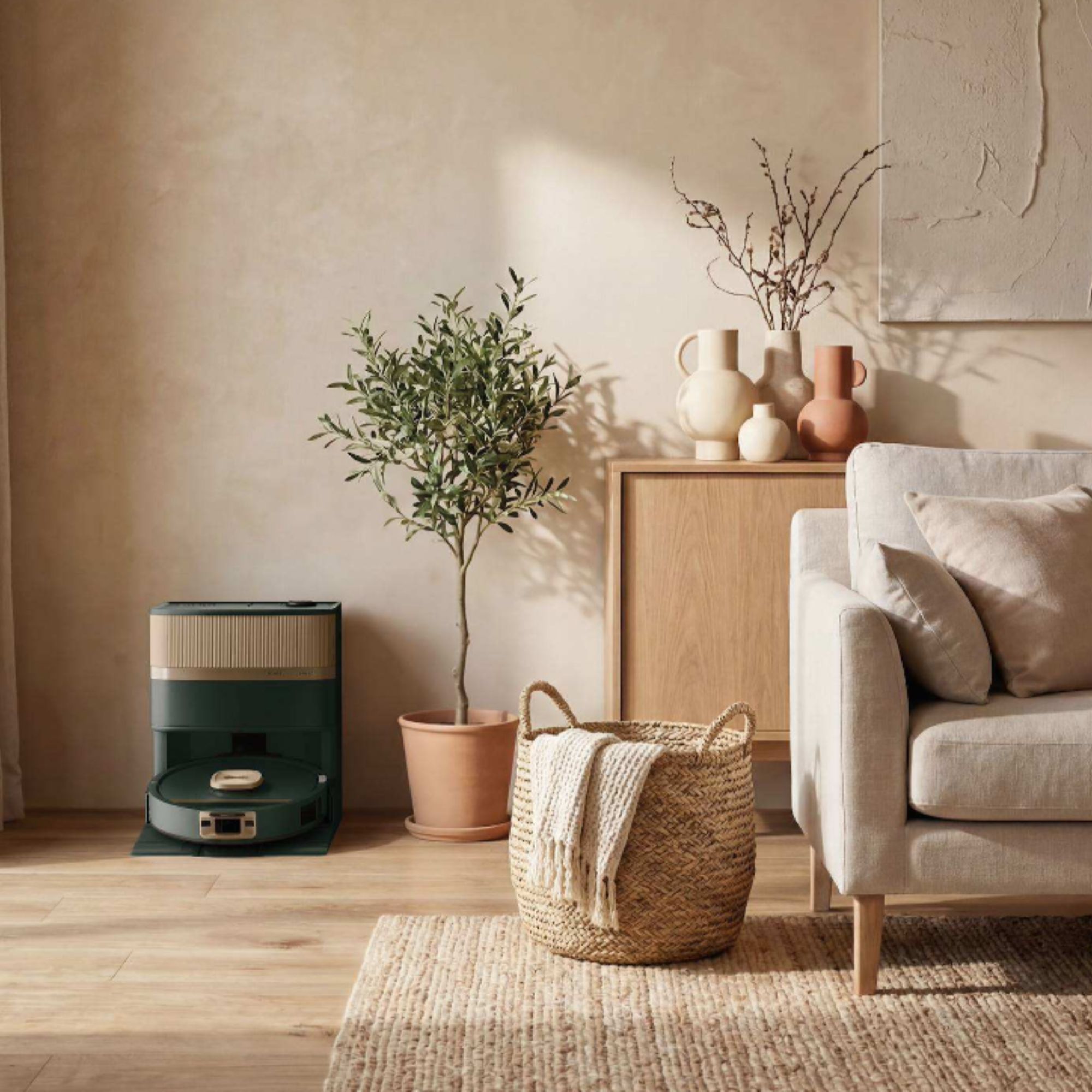 Green Shark robot vacuum in a boho-inspired living room, next to a plant and a wicker storage basket