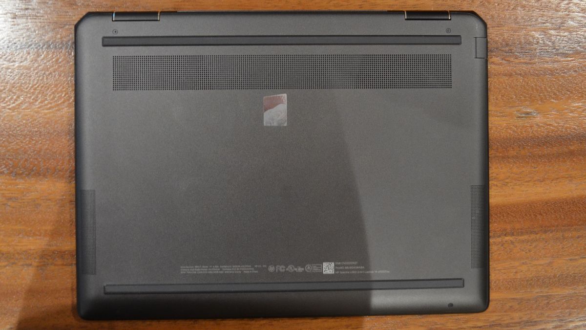 An HP Spectre x360 2022 on a wooden table
