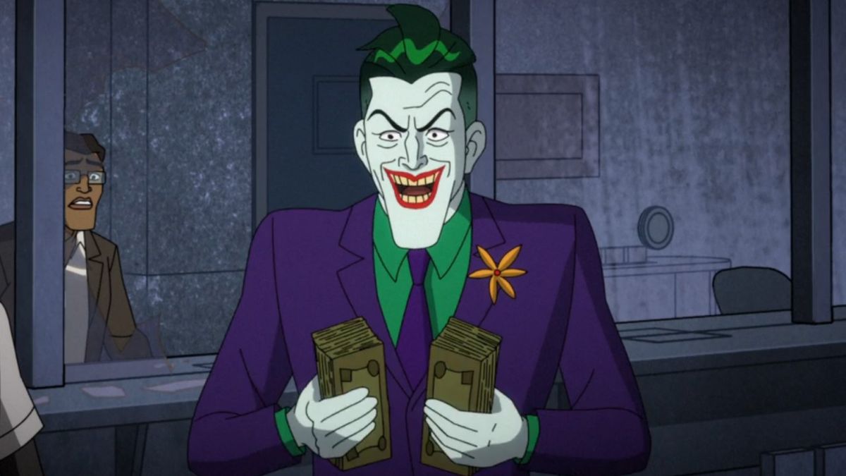 The Joker holding two stacks of cash in Harley Quinn