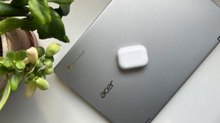 AirPods Pro 2 sat on top of a Chromebook