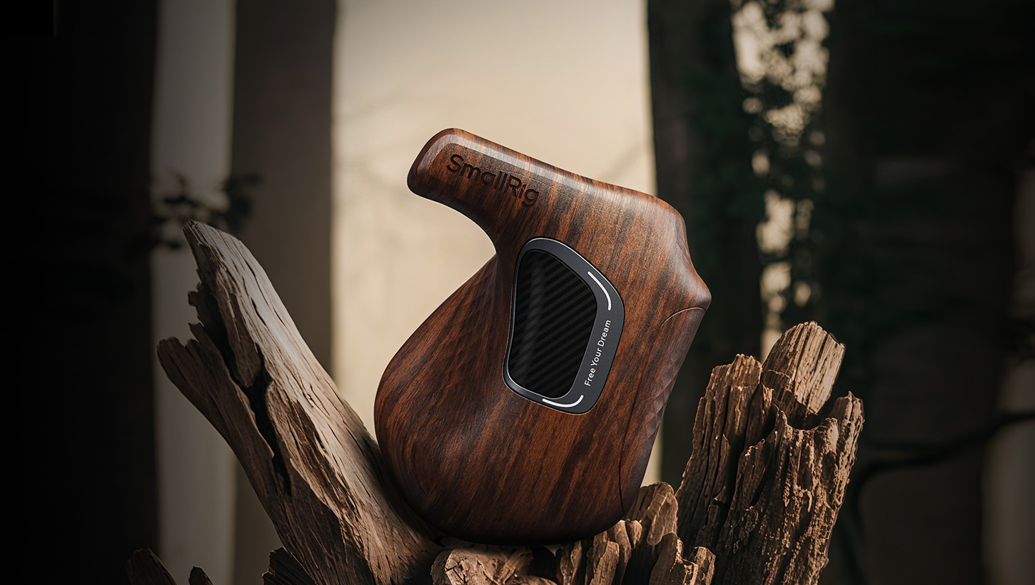 SmallRig Wooden handle perched atop a piece of wood