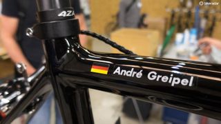 One of the bikes being worked on carries a very familiar name