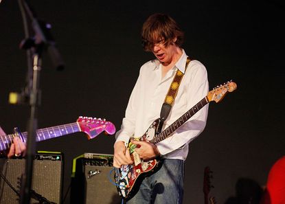 Sonic Youth guitarist collaborates with Sanders. 
