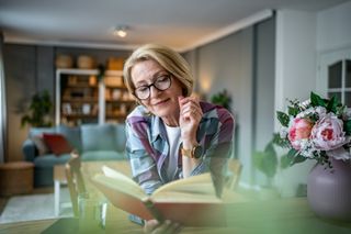 A woman reads a book