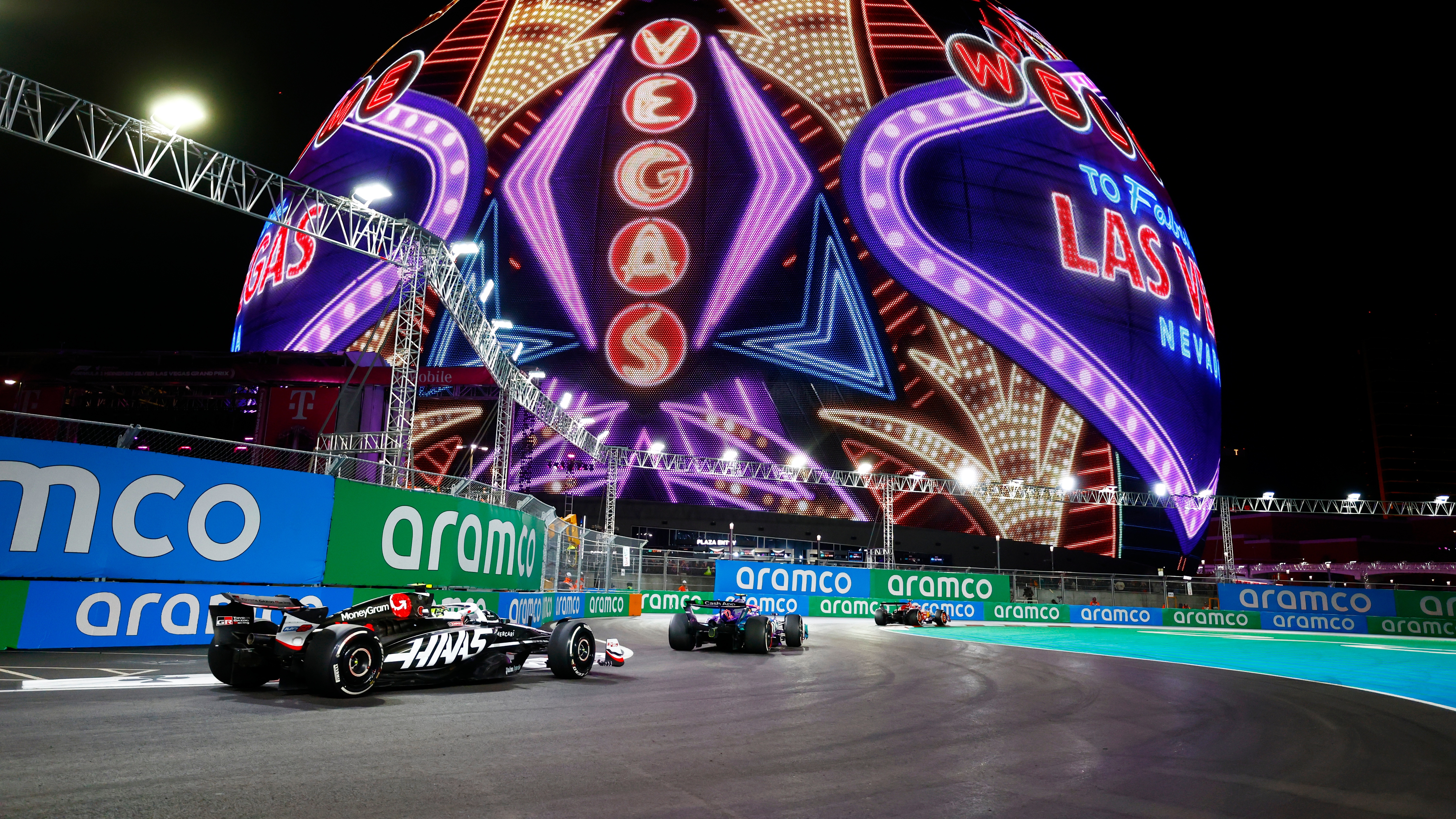  Cars race by the MSG Sphere with &#039;Welcome to Las Vegas&#039; sign graphics during the Formula 1 Heineken Silver Las Vegas Grand Prix on the Las Vegas Strip Circuit on November 23, 2024 in Las Vegas, Nevada. 