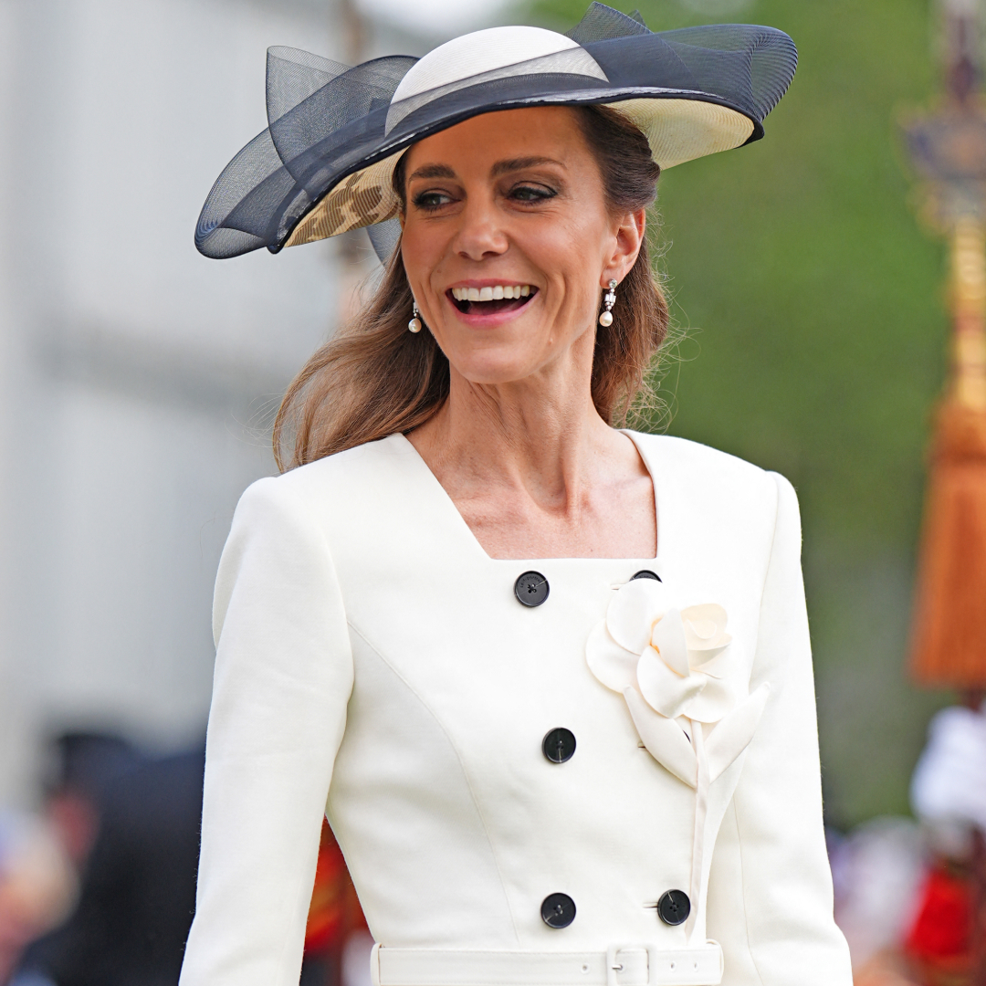 Princess Kate wearing a white blazer dress at a garden party