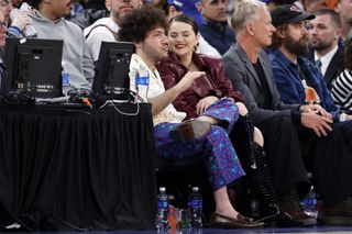 selena gomez and benny blanco at a Knicks game
