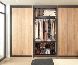 wooden closet with shoe rack